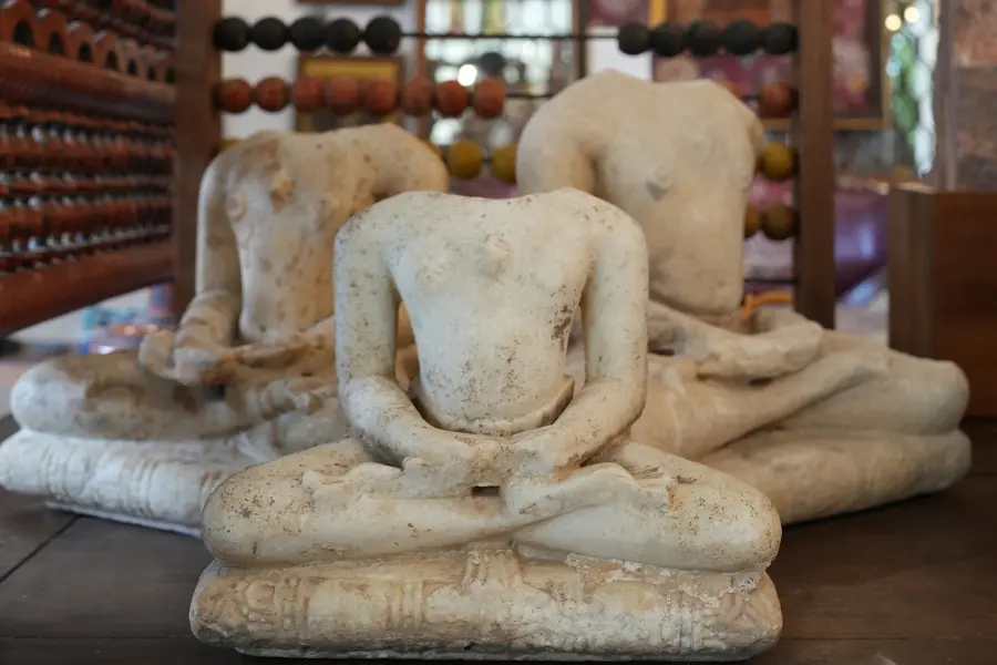 Vintage stone sculptures arranged in Circa Warehouse artefact display